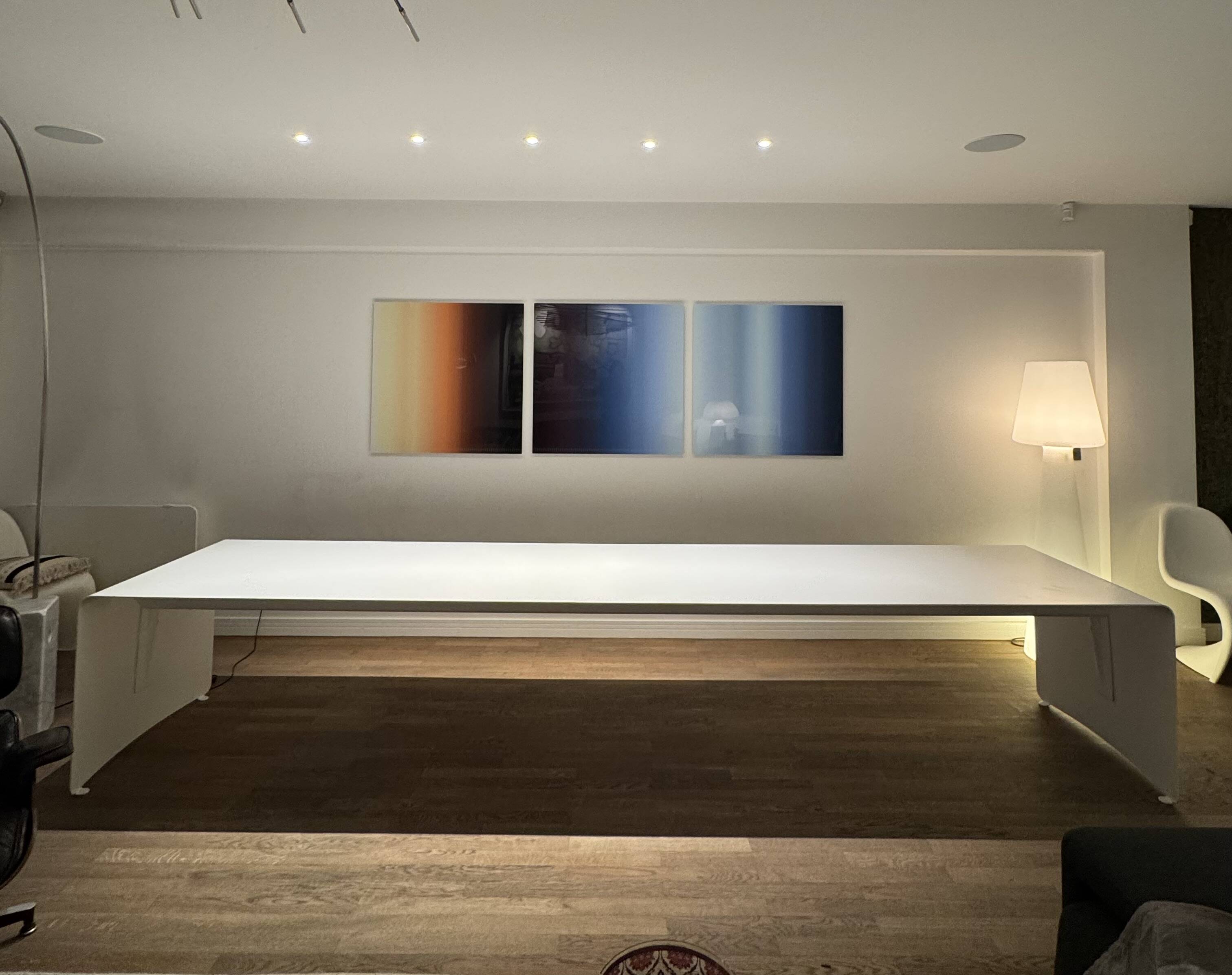 Large curved aluminium tabletop.