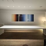 Large curved aluminium tabletop.