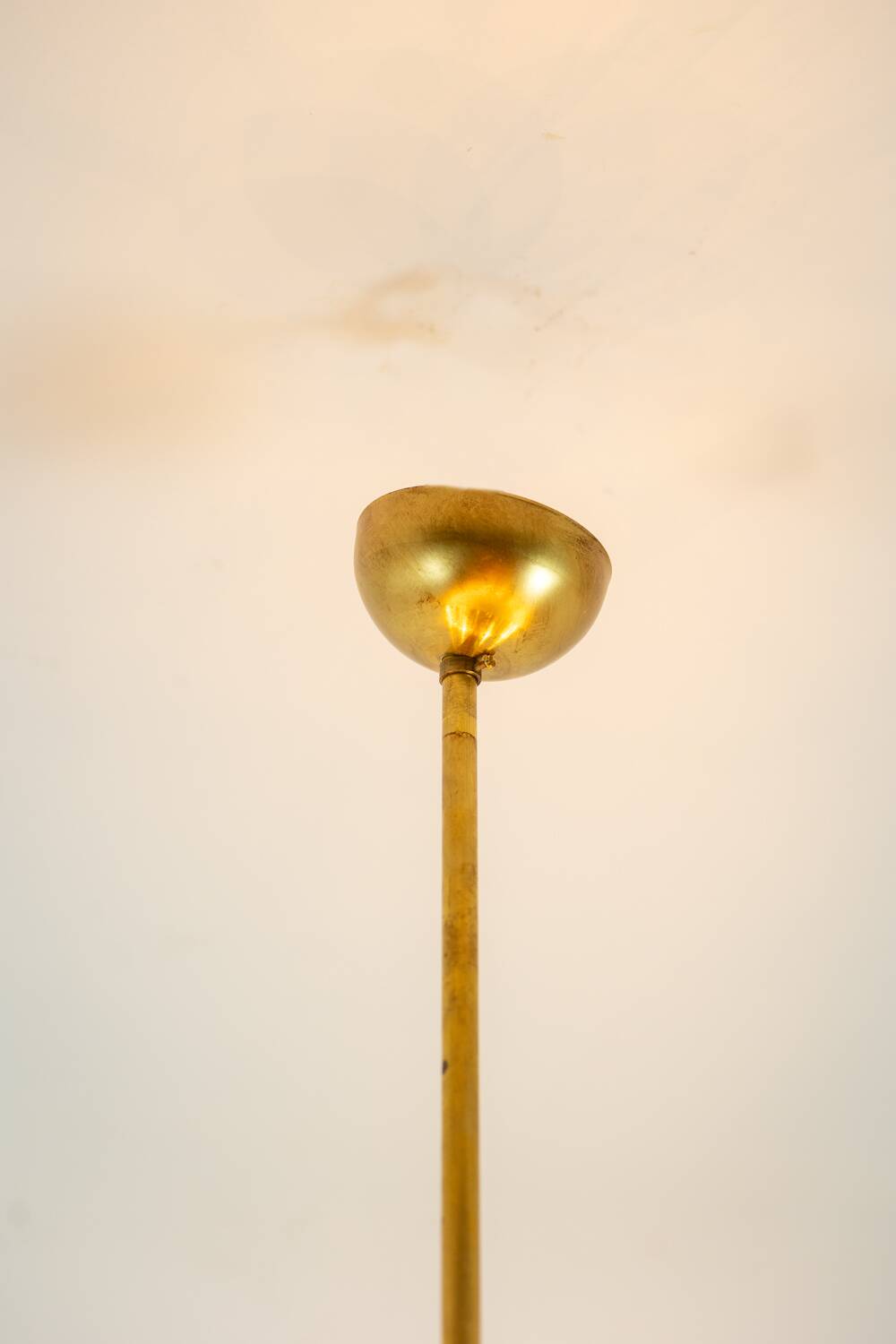 Pair of 24-light patinated brass chandeliers. 1980s.