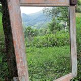 Mirror (3 panels) on door.