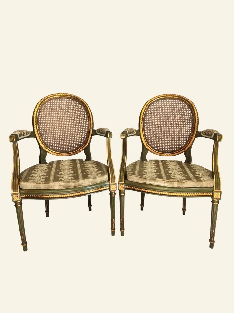 Pair of Louis XVI style armchairs, oval backrest and caning.