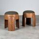 Sculptural pair of ash wood stools with dedar milano bouclé