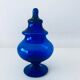 Blue glass apothecary shaped bottle