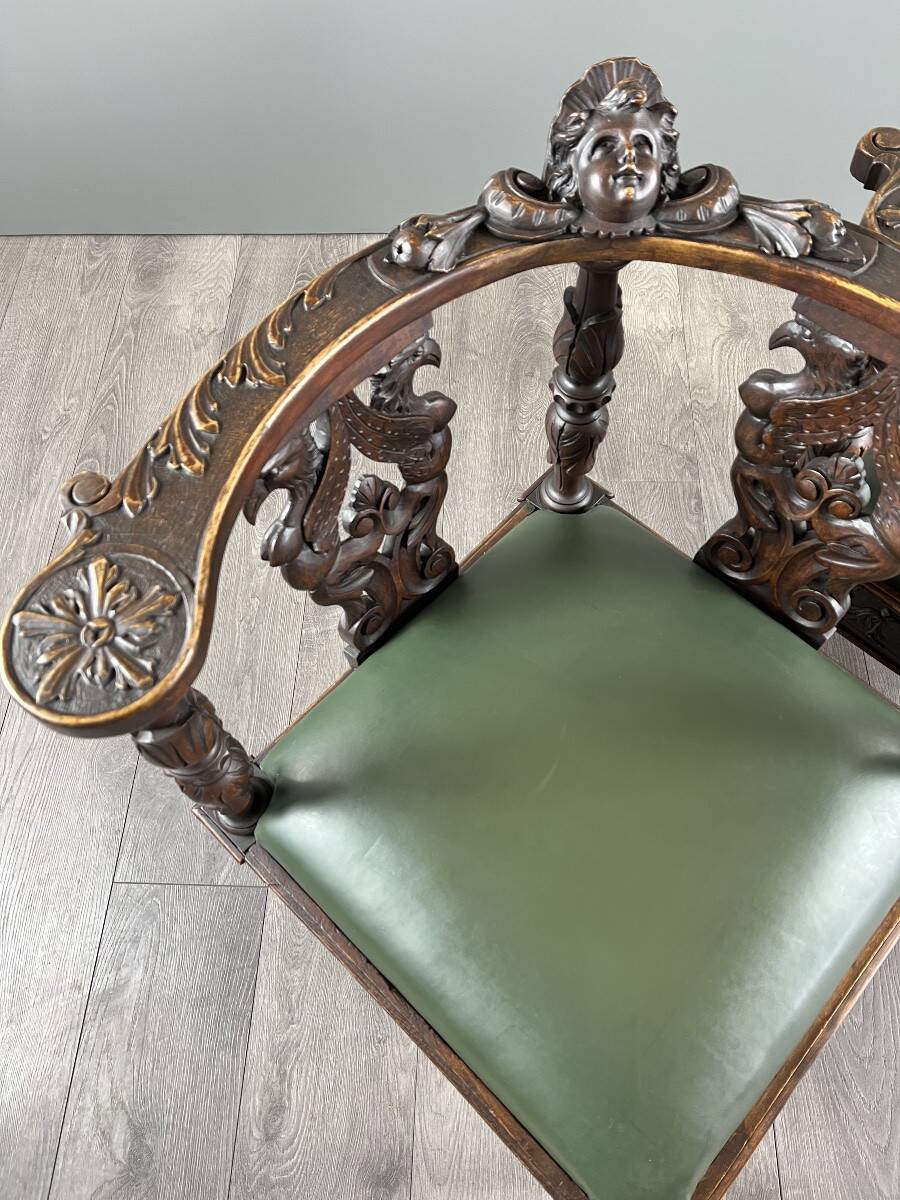 Pair of corner armchairs in carved wood, 19th century
