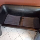Black leather two-seater sofa