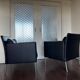 2 fauteuils de salon modernistes allemands en cuir noir et acier de Walter Knoll