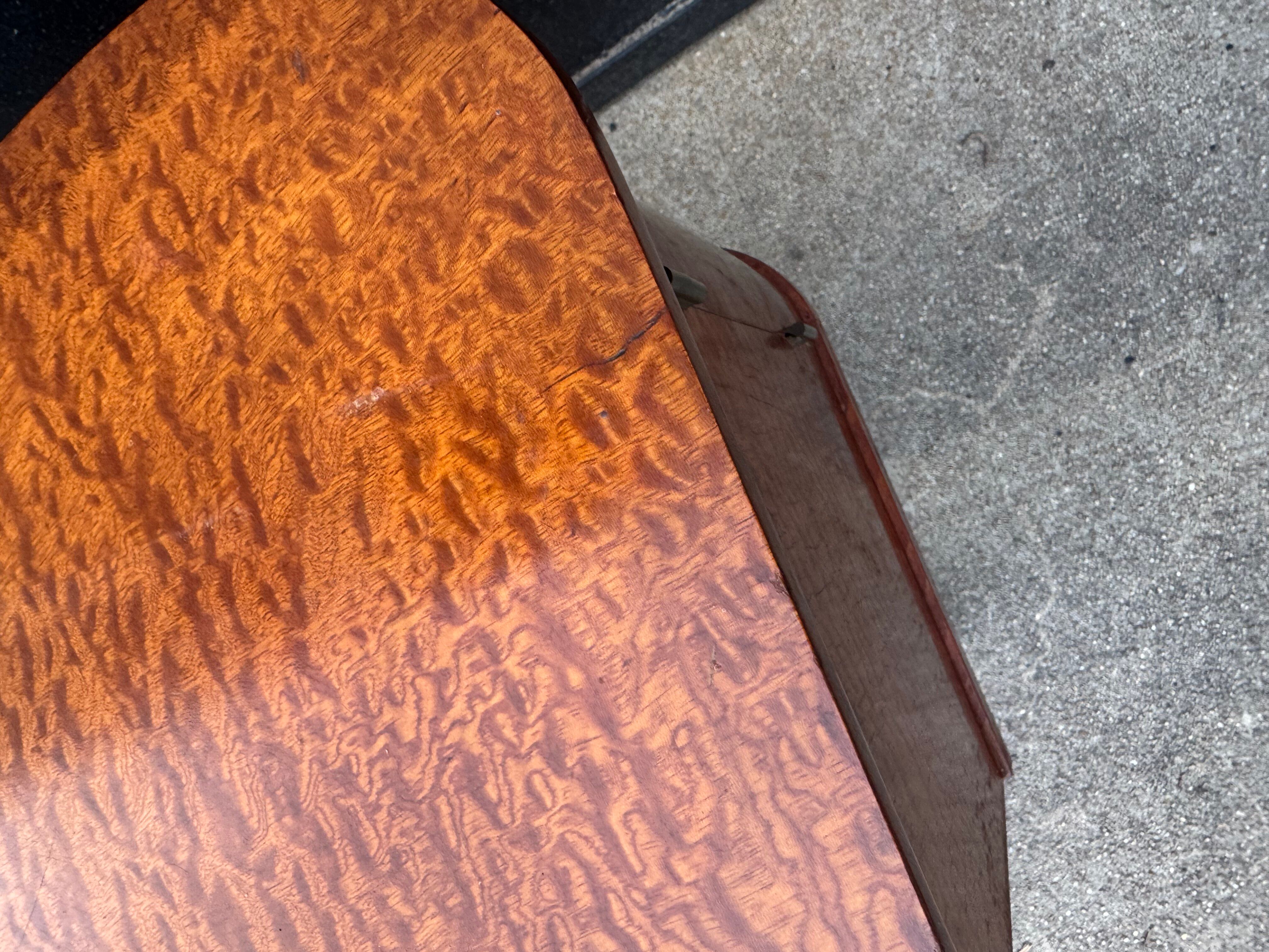 Mahogany veneered bedside table from the 1950s.