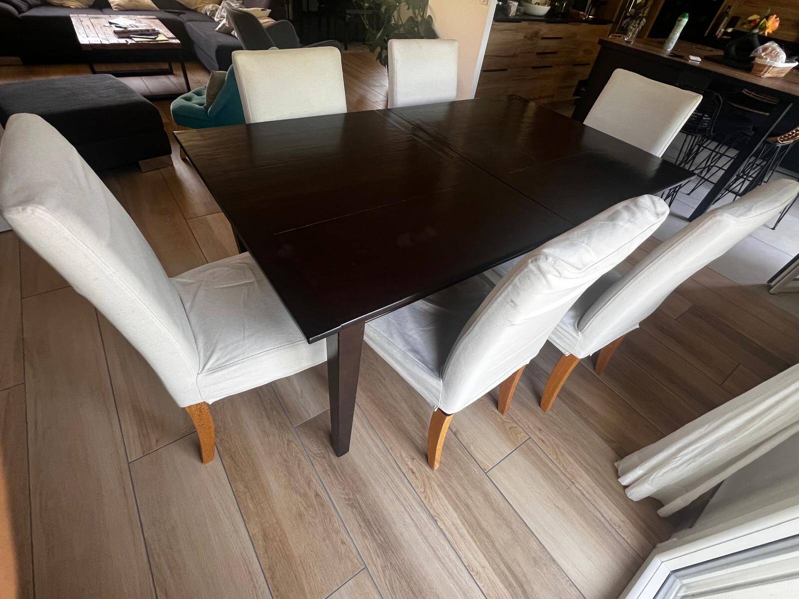 Solid cherry wood dining table, extendable for 8 to 12 people.
