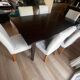 Solid cherry wood dining table, extendable for 8 to 12 people.