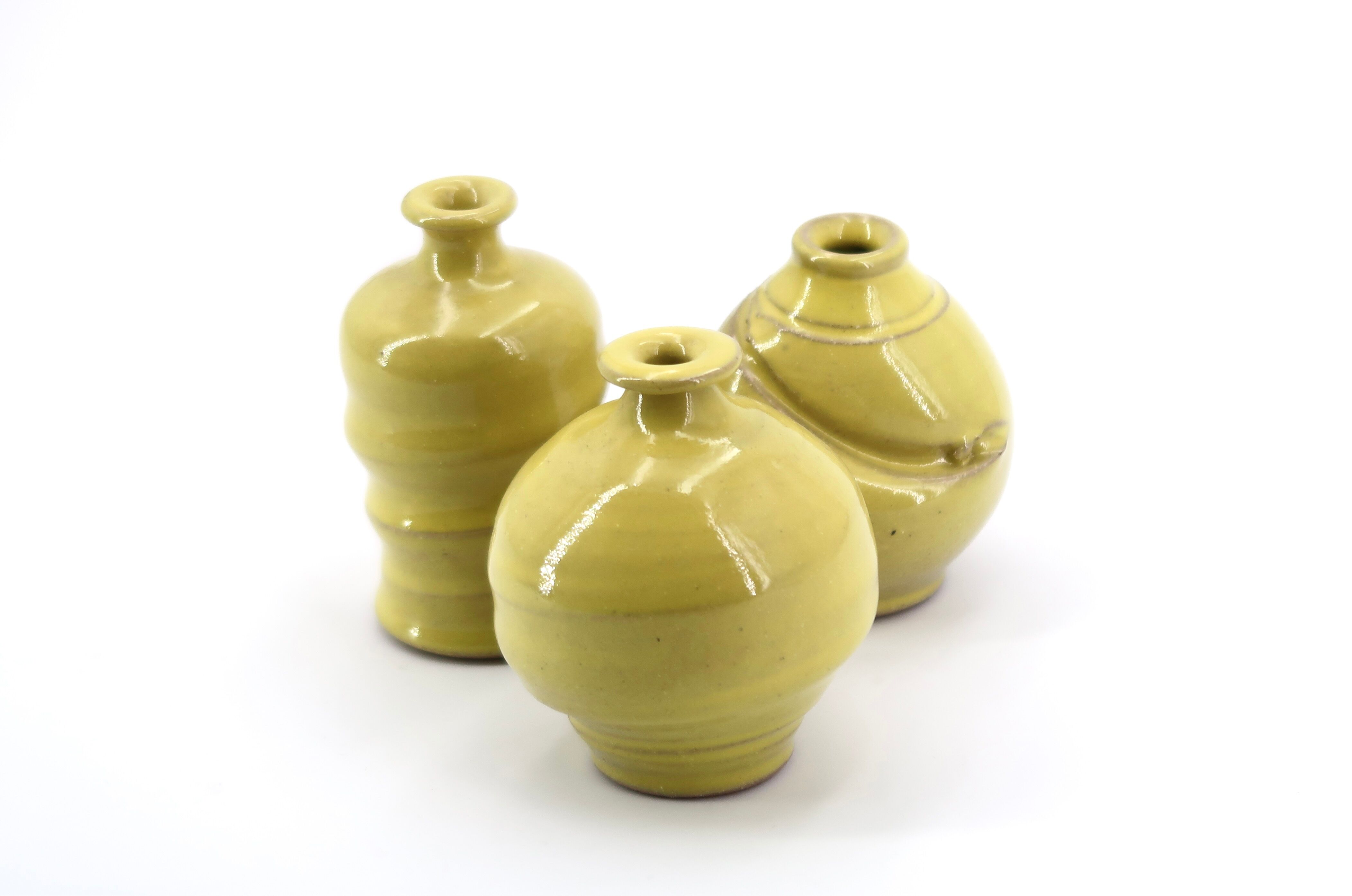 Trio of yellow ceramic vases, 70s