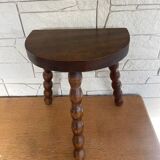 Low tripod stool with turned legs