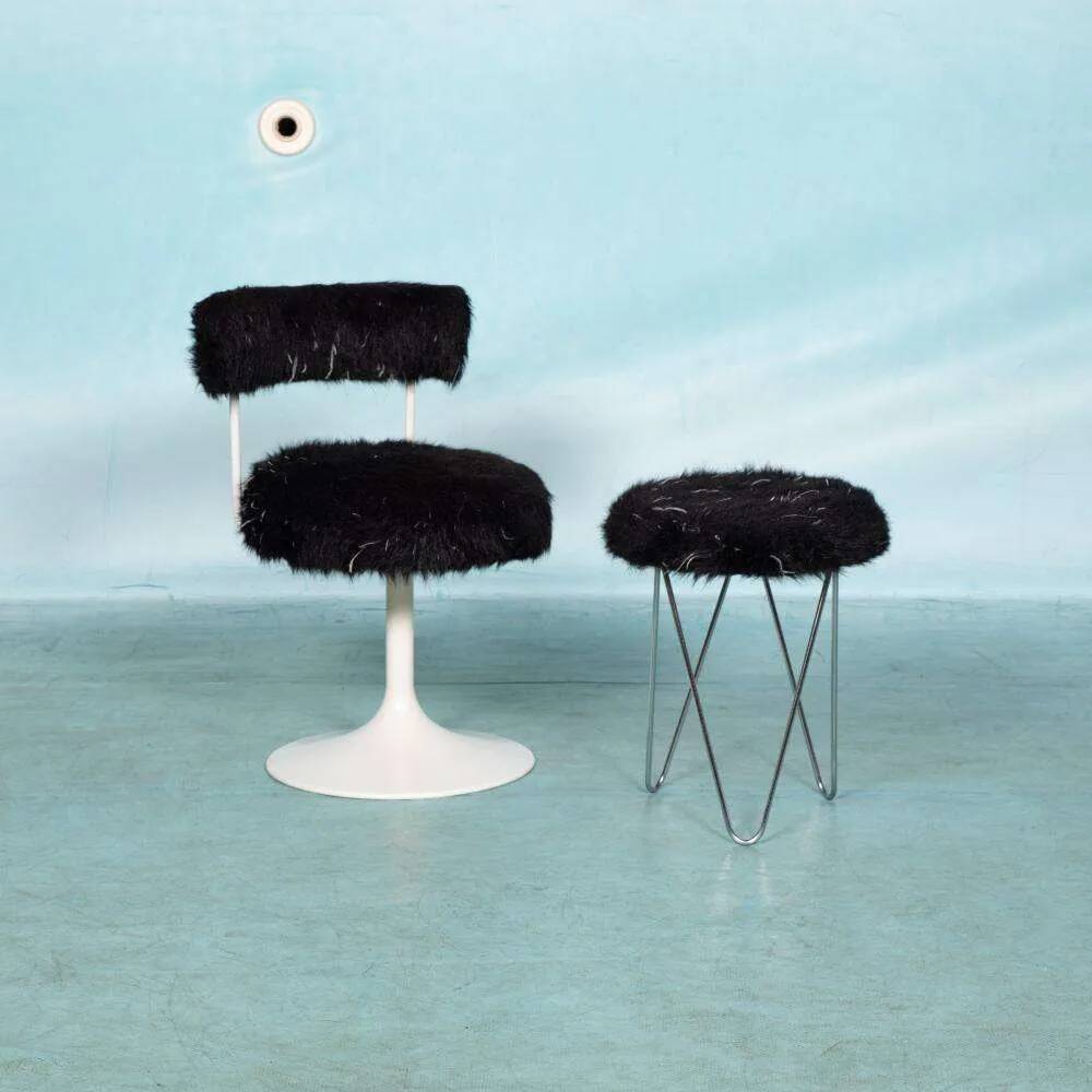 Space age design armchair from the sixties, fluffy stool with trumpet base.