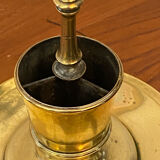 Compartmentalised brass candlestick