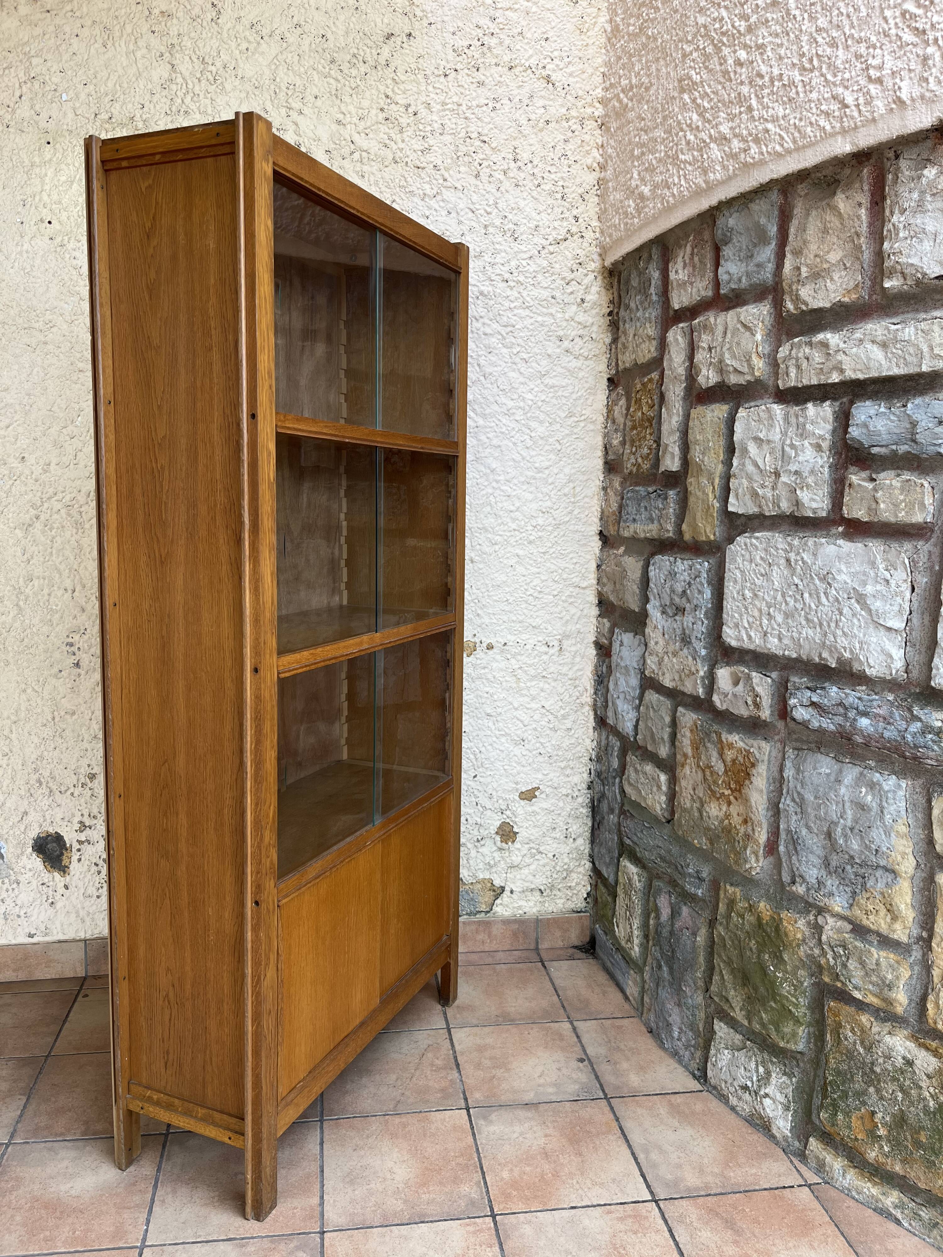 1950 oak glazed bookcase Émile SEIGNEUR
