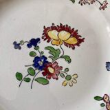 7 hand-painted flowered dinner plates.