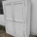Old rustic Parisian wardrobe patinated white in oak and fir