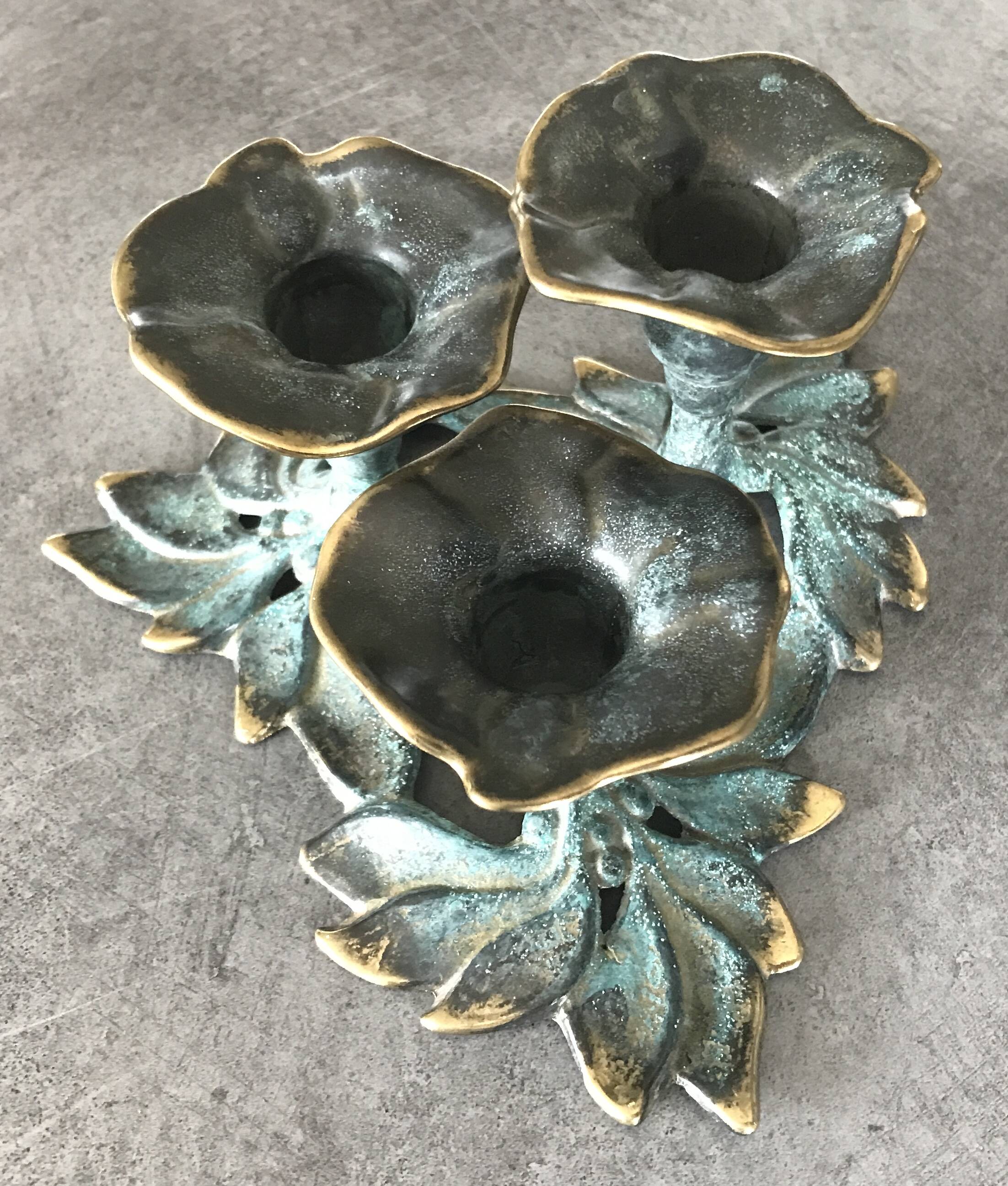 3-flower brass candlestick with green patina
