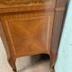 Commode a ressaut central en bois d'amarante et bois de rose XX siècle