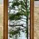 Large and old bevelled framed floor mirror.