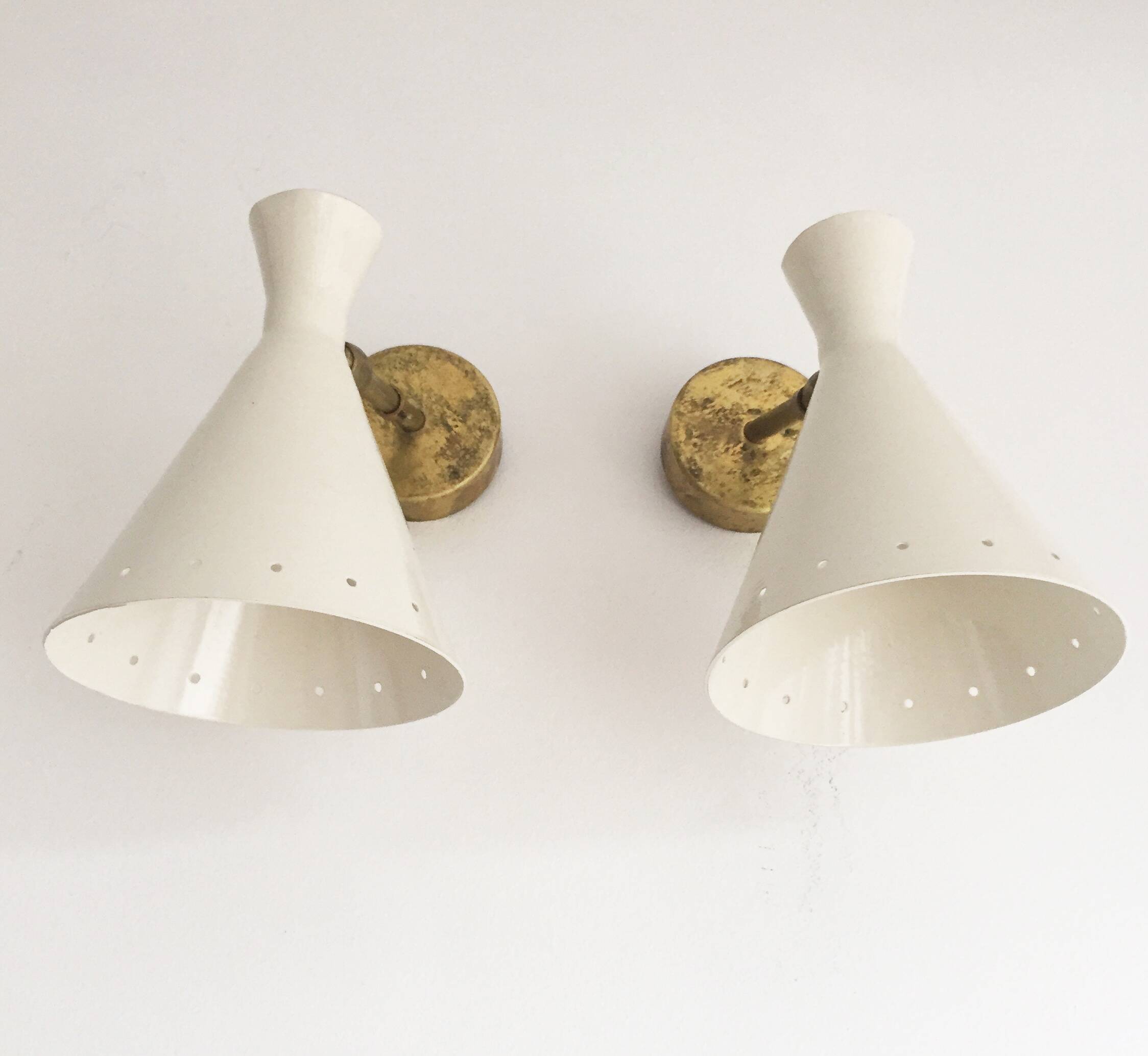Set of three Italian design wall lights from the 1950s.