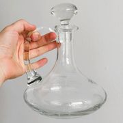 Carafe ancienne en verre soufflé à la bouche
