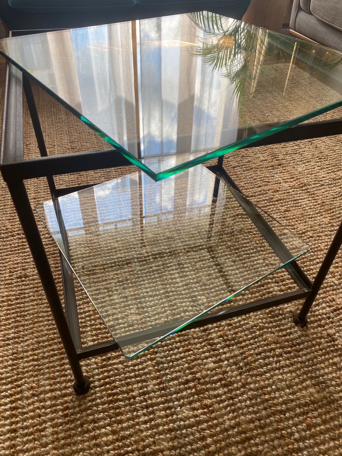 Glass and wrought iron coffee table design