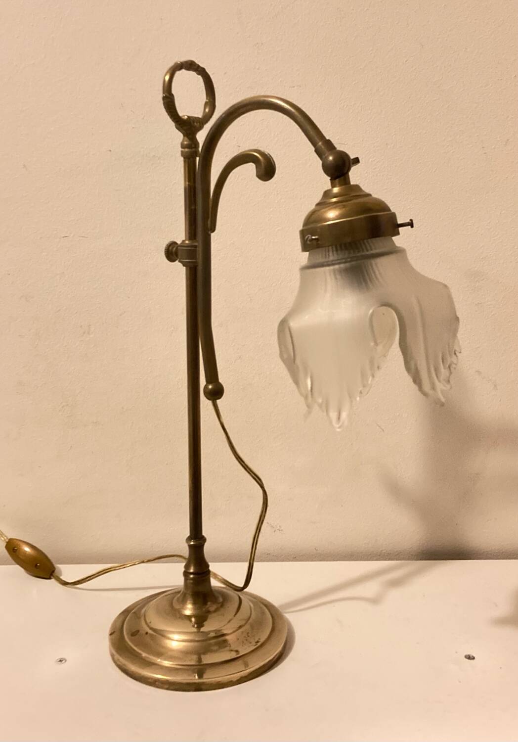 Brass table lamp with a glass shade