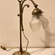 Brass table lamp with a glass shade