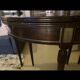 Dark wood Regency style folding demi-lune table