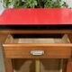 Bistro sideboard with 1 mahogany door and Formica top from the 1950s.