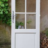 Old wooden door with small squares