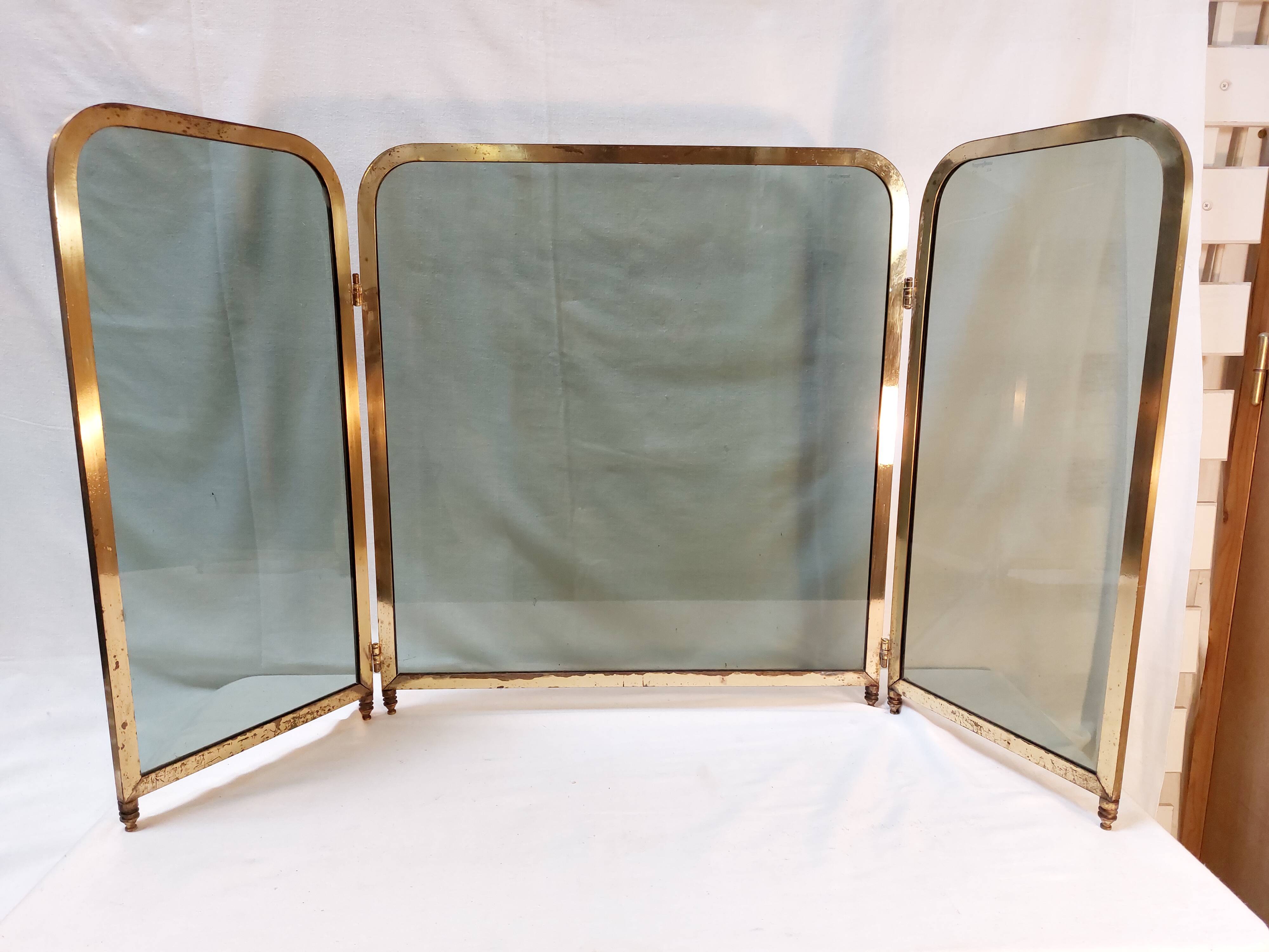 Vintage fireplace screen in smoked glass and gold-tone metal
