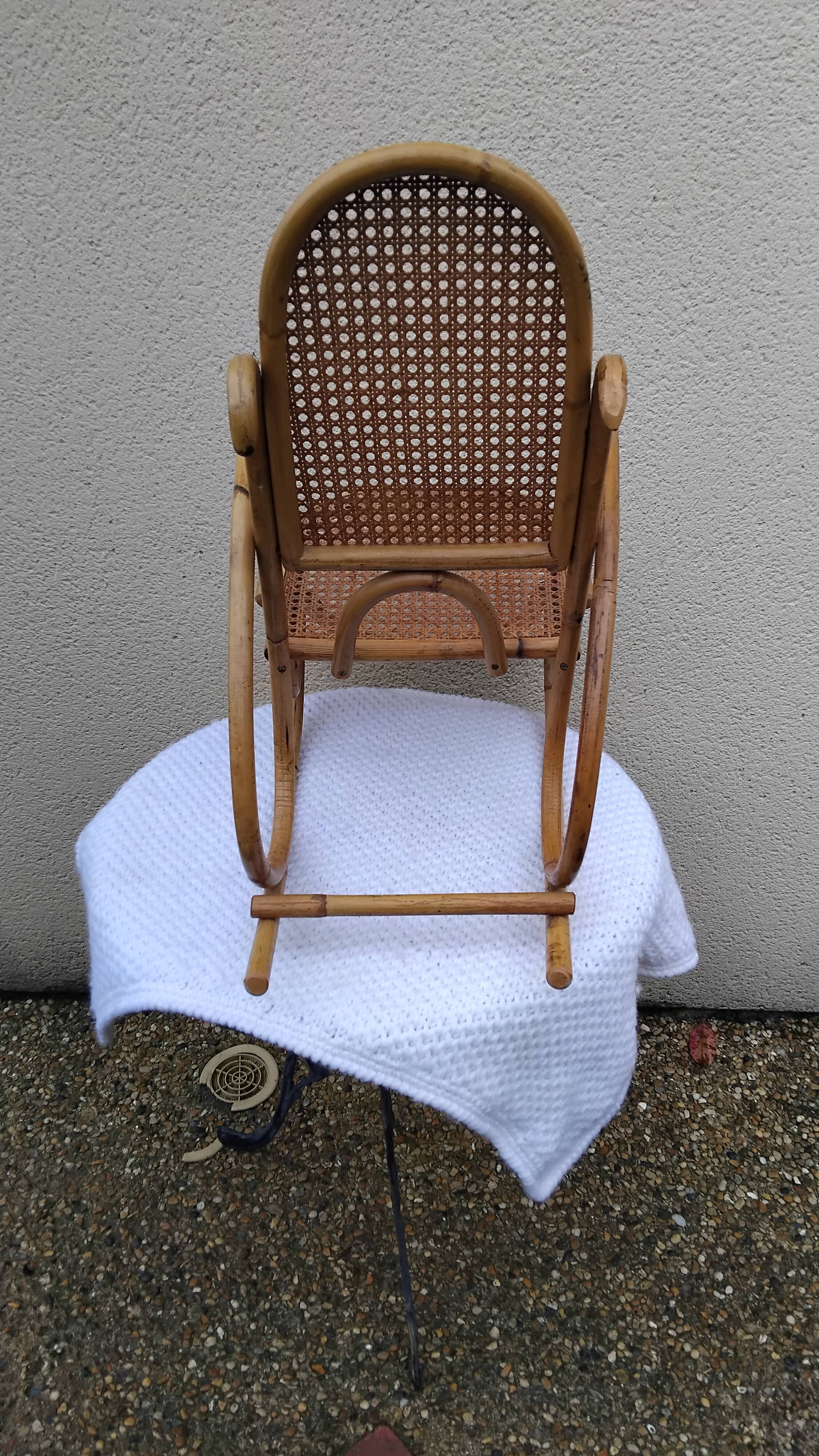 Vintage rattan and bamboo children's rocking chair