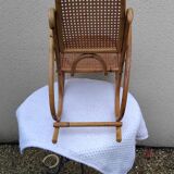 Vintage rattan and bamboo children's rocking chair
