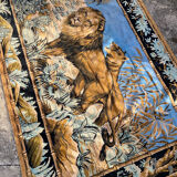 Antique velvet wall tapestry depicting a lion and lioness scene