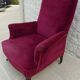 Blackened wooden bergère on wheels, Napoleon III period, upholstered in velvet.