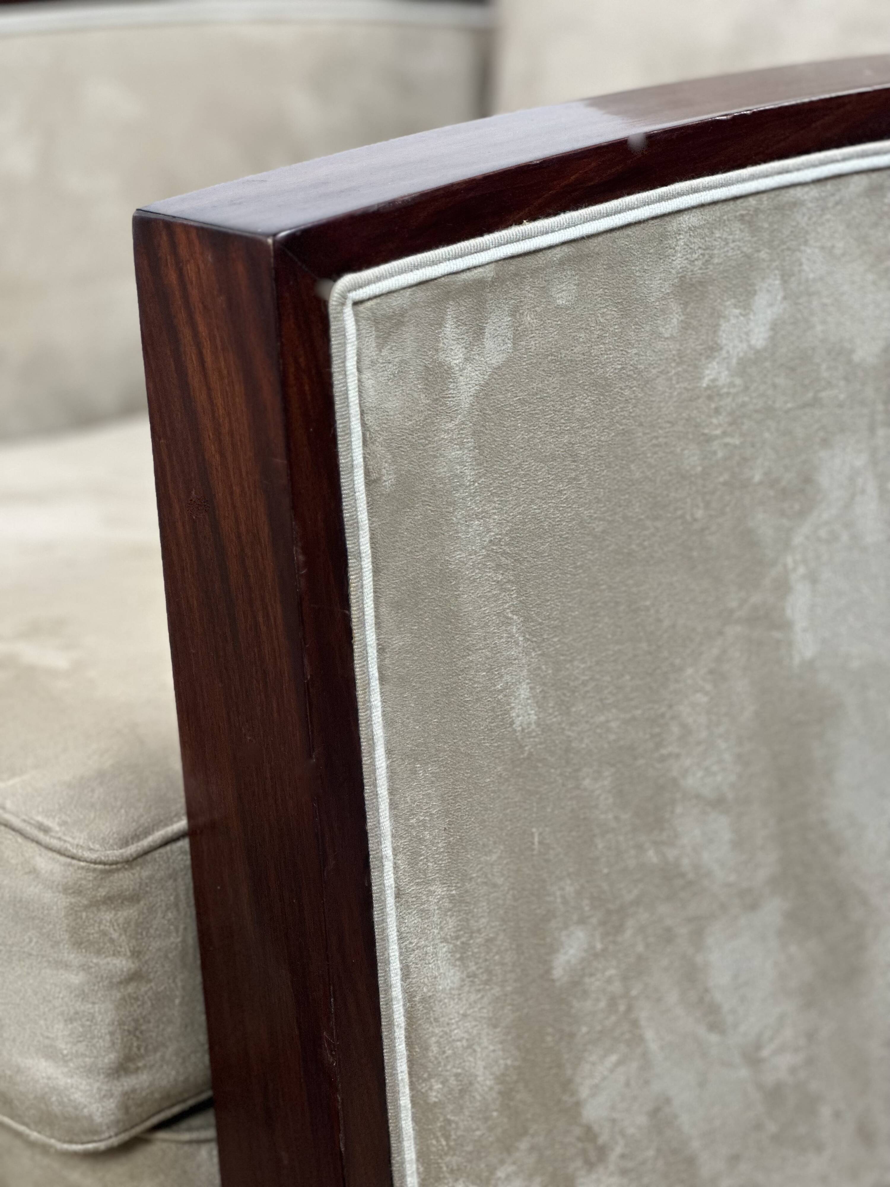 Pair of Art Deco armchairs in rosewood and suede.
