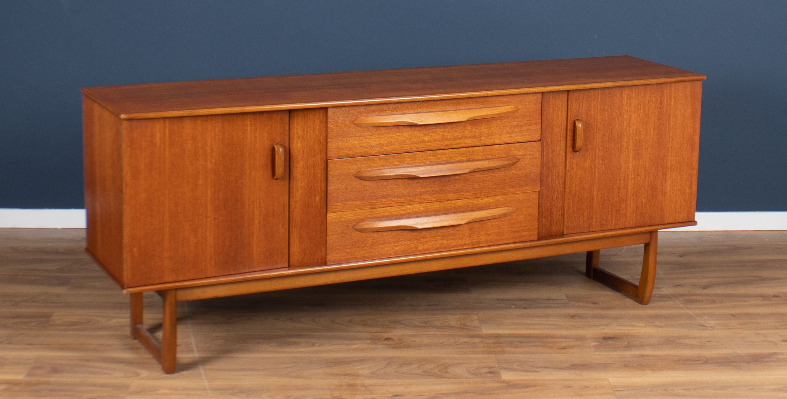 Teak 1960s sideboard with sleigh legs