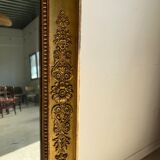 Golden mirror style Restoration decorated with stretched palmettes