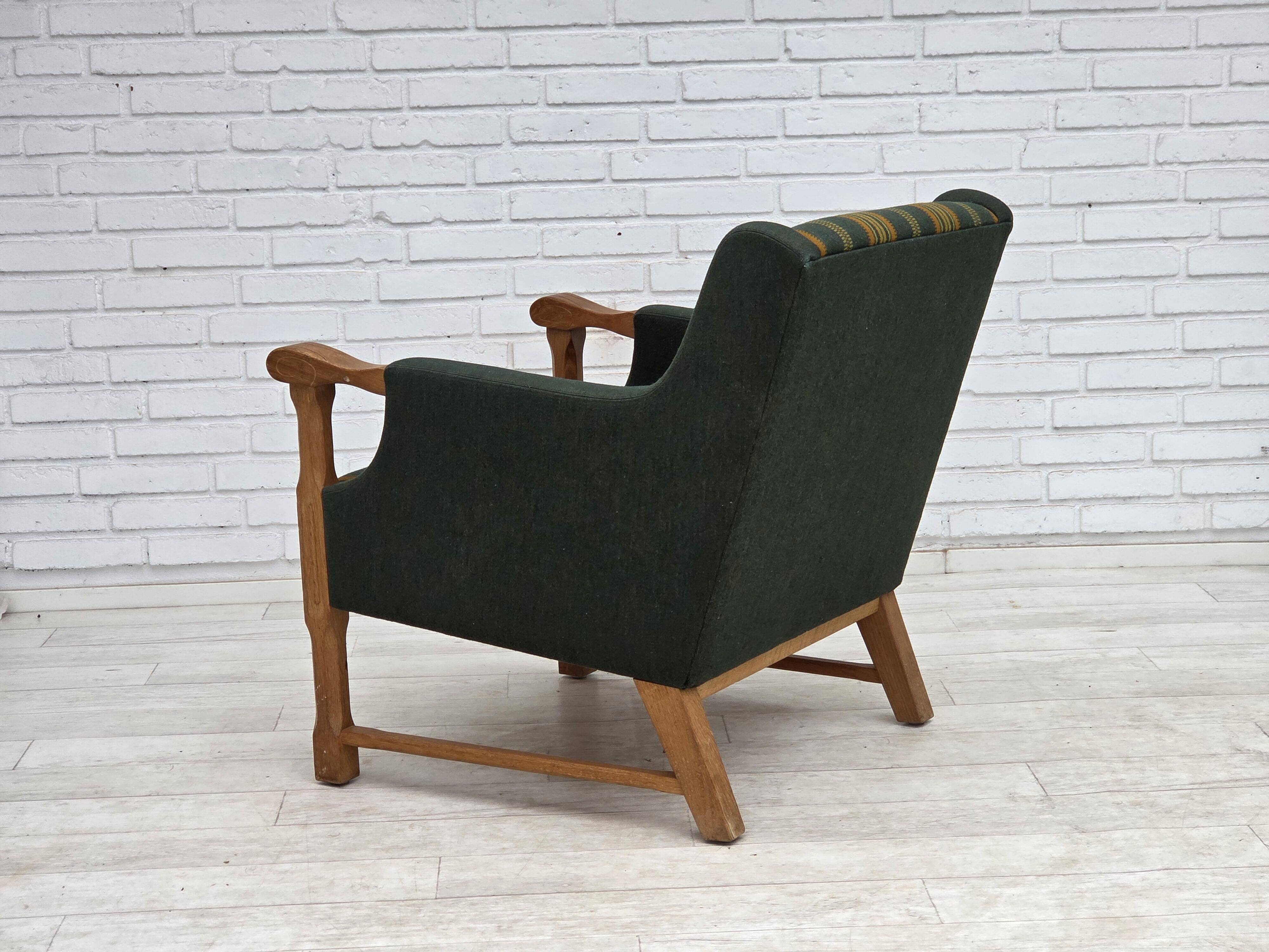 1970s, Danish armchair, green furniture wool, solid oak wood.