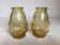 Pair of small yellow moulded glass vases