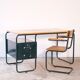 Desk with bauhaus style tubular steel chair