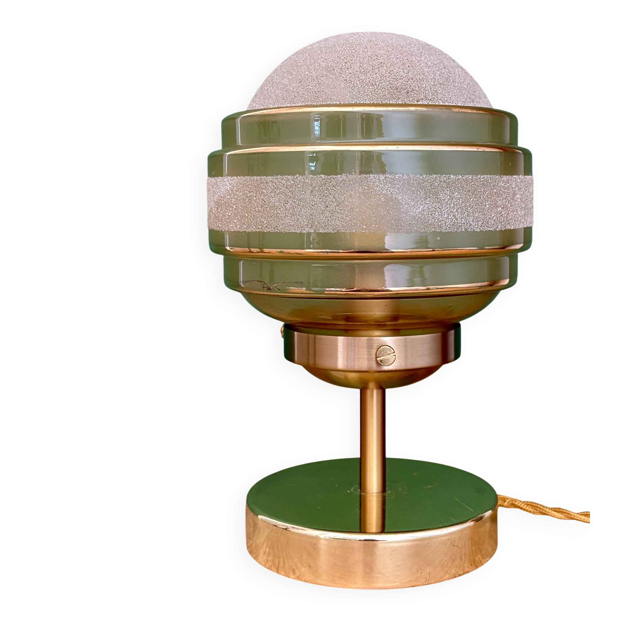 Vintage globe table lamp in frosted yellow and gold glass.