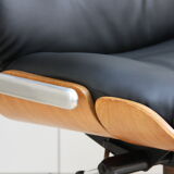 Vintage swivel office armchair in black leather and wood by Giroflex 60s