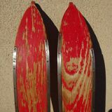 Pair of old wooden skis and metal bindings altiere