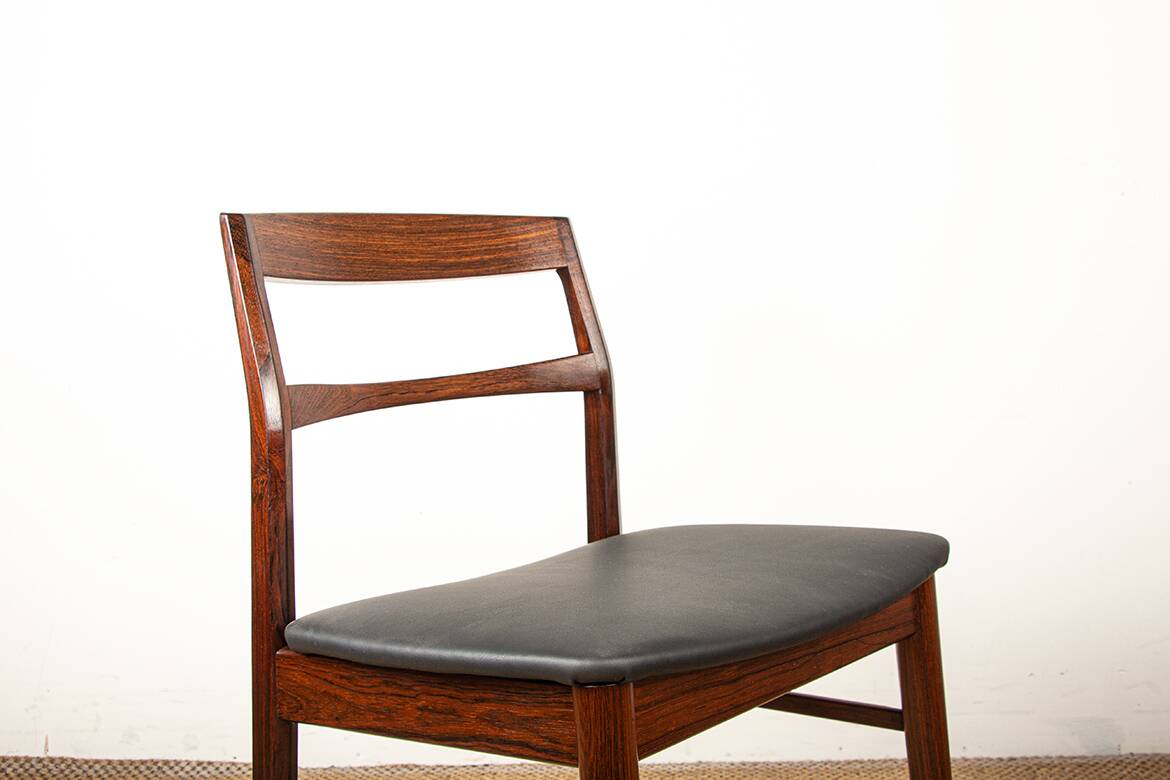 4 Danish chairs in rosewood and new leatherette by Henning Kjaernulf 1960.