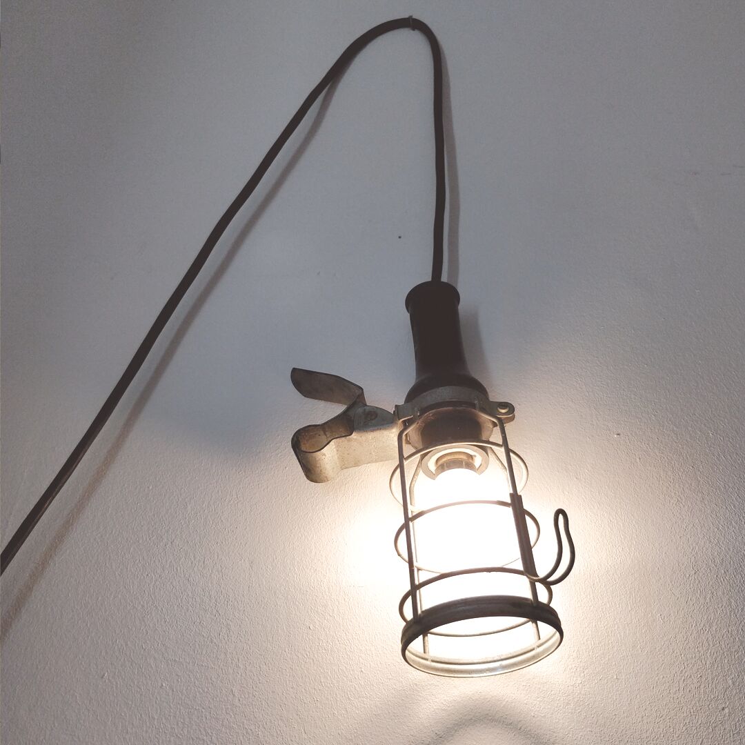 Black industrial atrow walking lamp