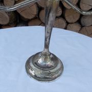 Patinated silver candlestick