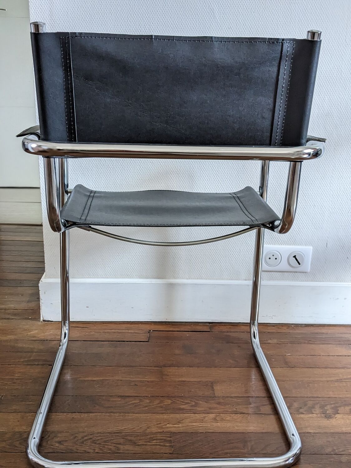 Vintage designer leather and metal armchair