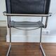 Vintage designer leather and metal armchair